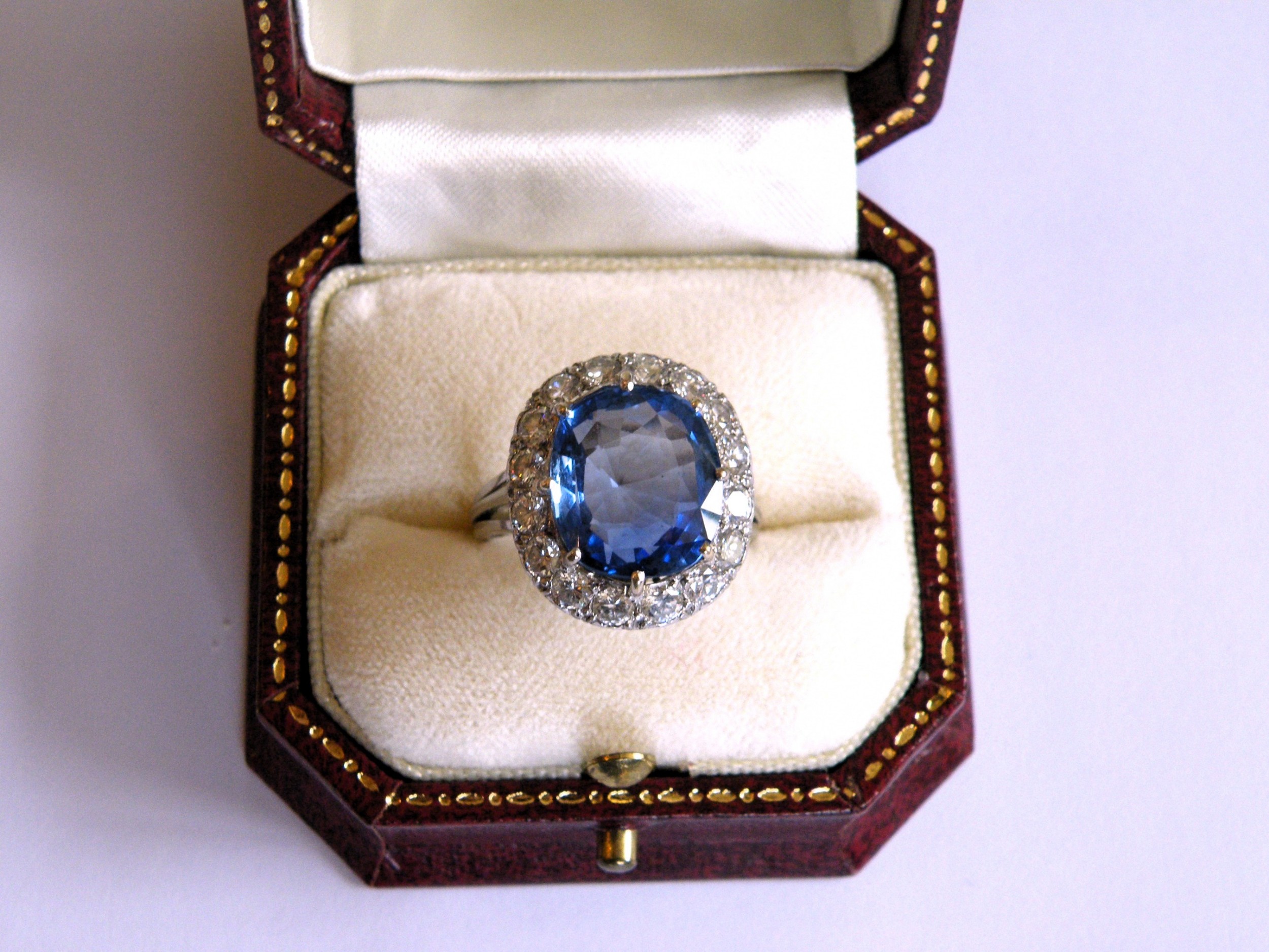 a stunning 84 carat sapphire and 16 carat diamond cluster ring