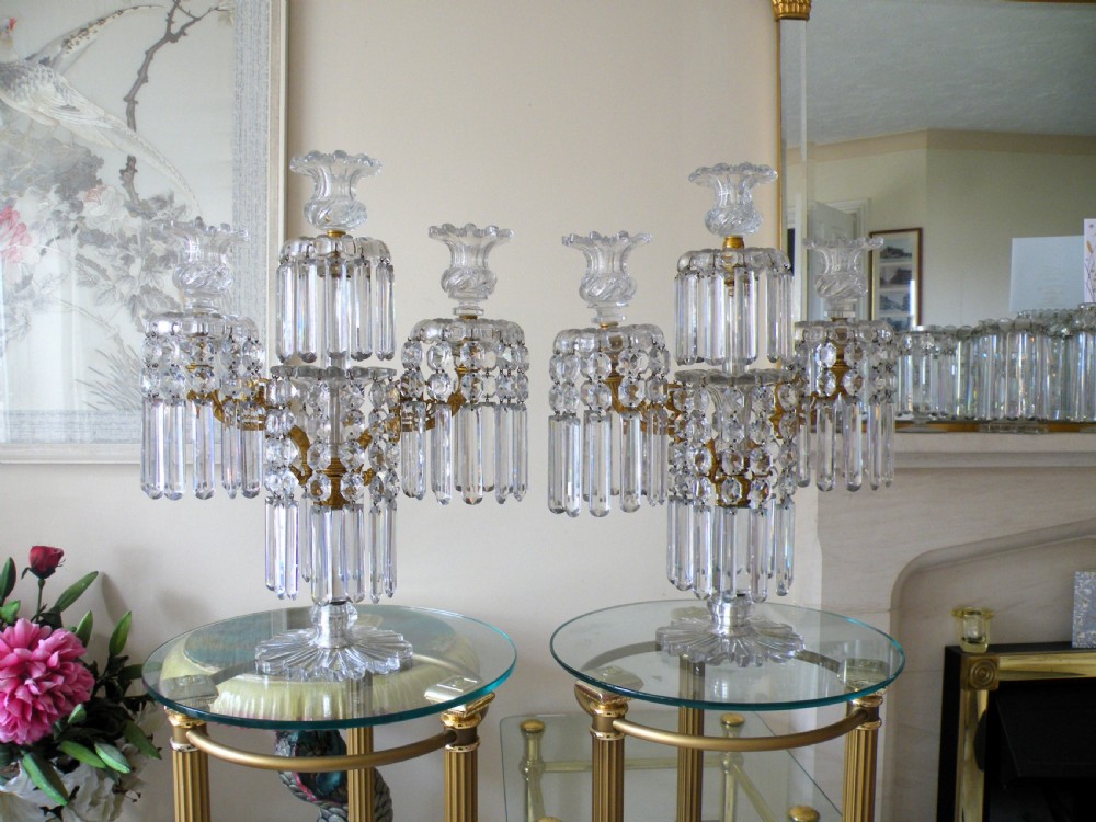 a magnificent pair of regency three light glass candelabra