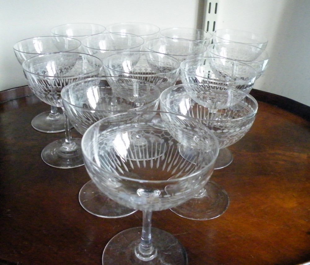 a fine and rare set of 14 victorian champagne glasses coupes