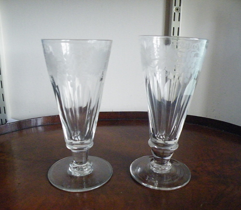 two large hand made 19th century engraved wine glasses