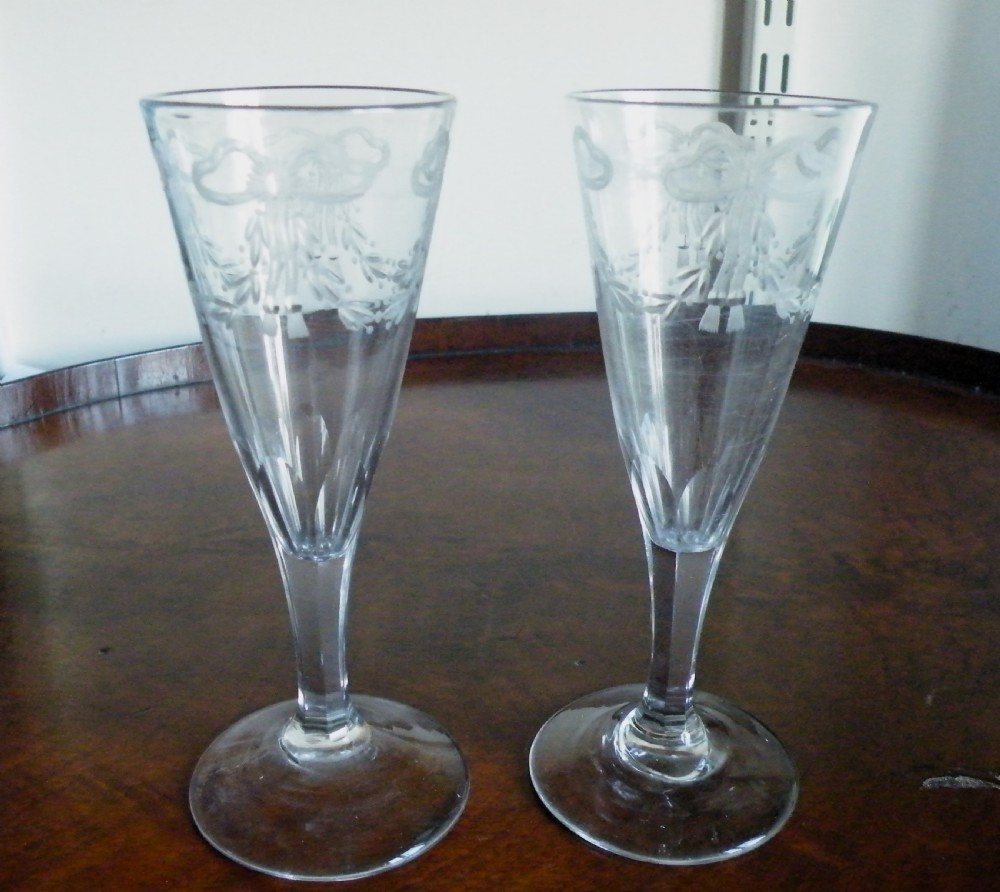 a nice pair of regency engraved glass champagne flutes