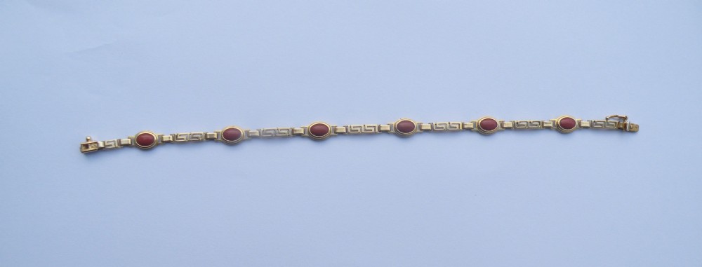 a pretty 14ct gold and coral bracelet