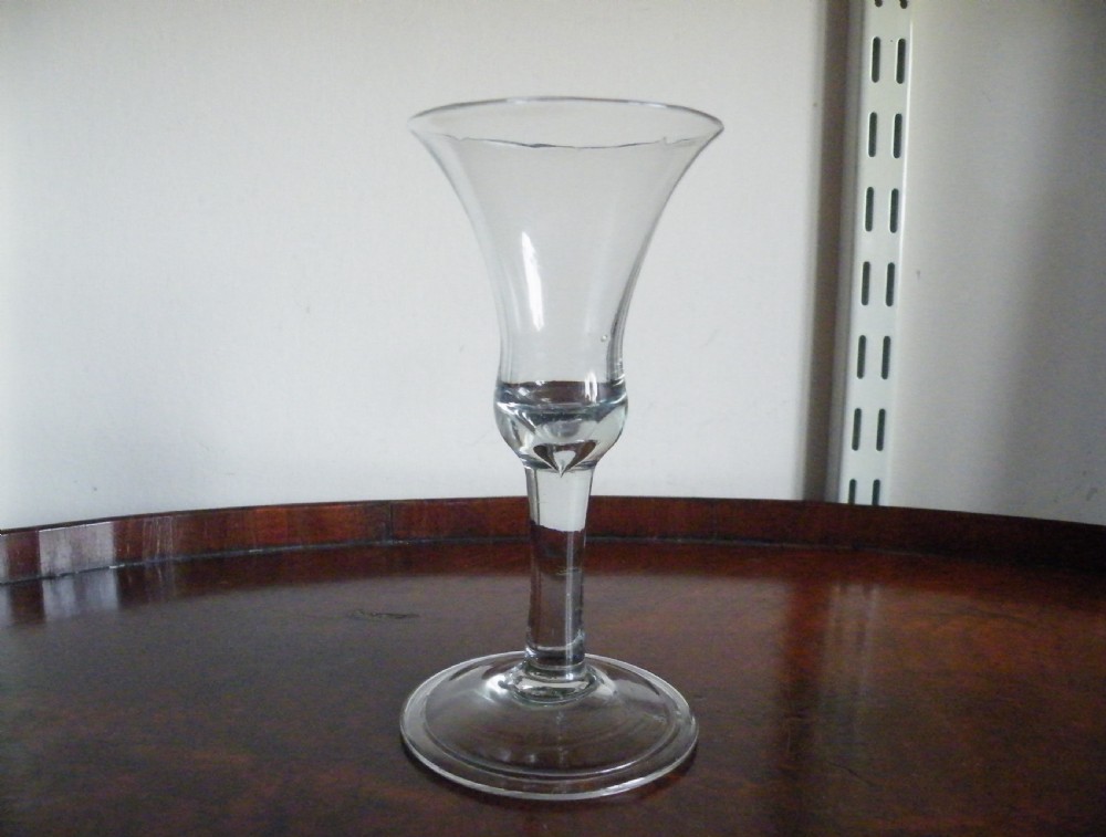 a mid 18th century plain stem wine glass