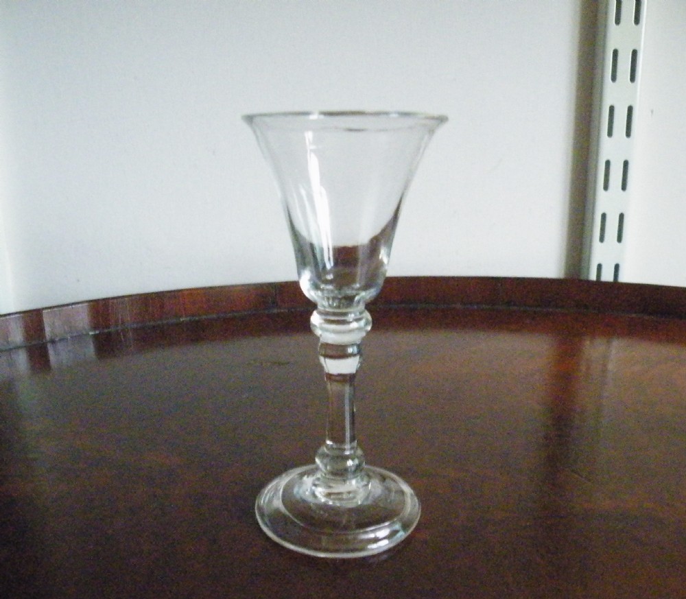 an early 18th century gin glass