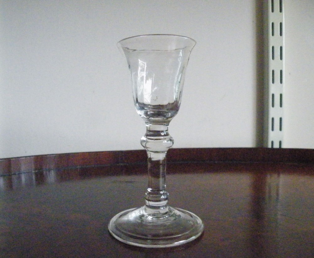 an early 18th century gin glass