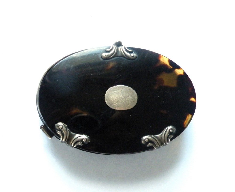 a good georgian silver and tortoiseshell oval magnifying glass