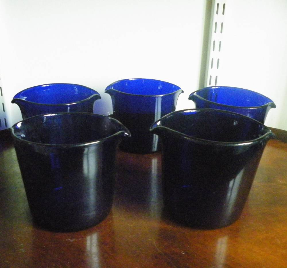 a set of five antique bristol blue double lipped wine rinsers finger bowls