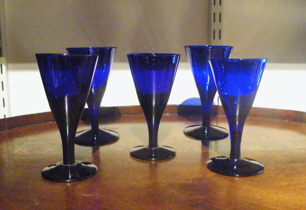 five antique bristol blue wine glasses