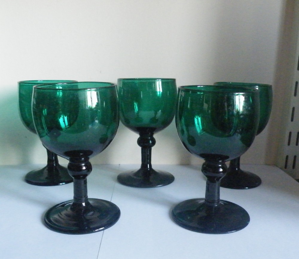 a set of 5 georgian green wine glasses