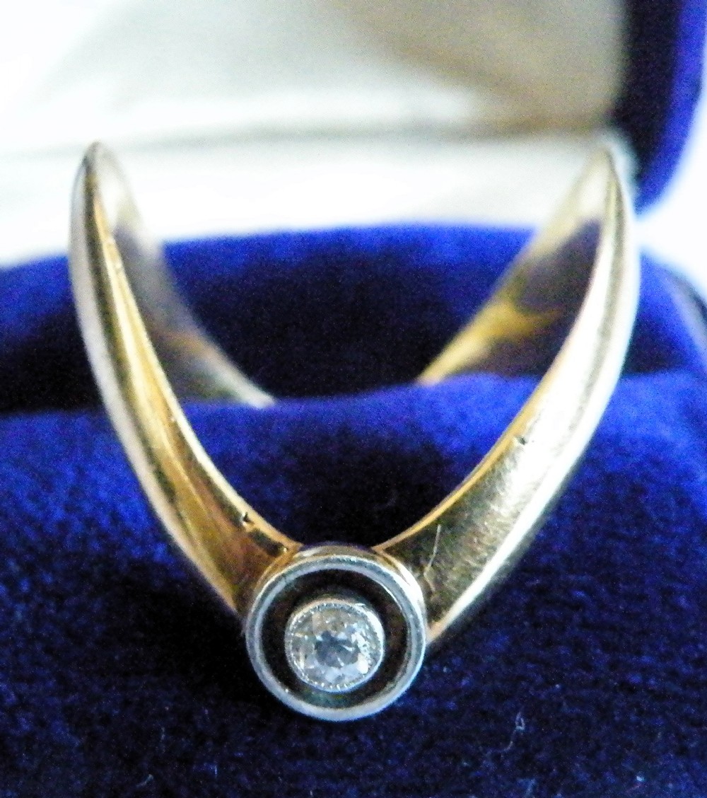 a victorian 18ct gold and diamond wishbone ring