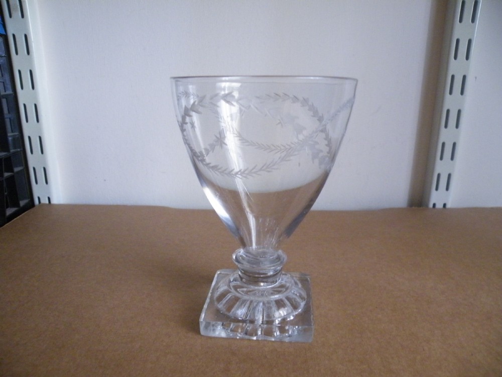 an 18th century engraved lemon squeezer base rummer
