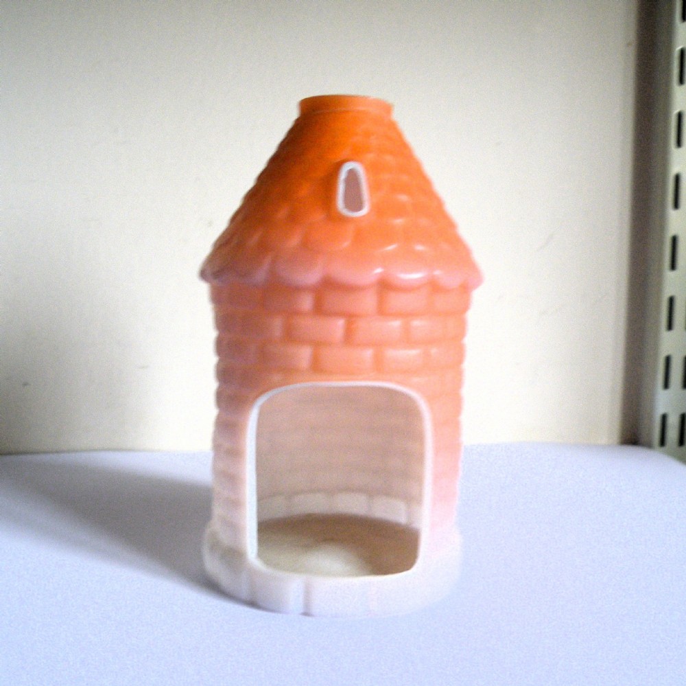 a rare victorian glass night light in the shape of a houise